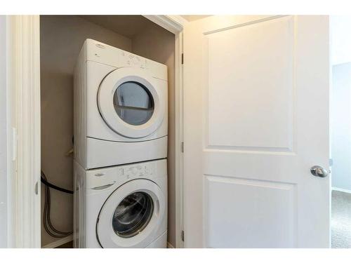 27 Nolanfield Terrace Nw, Calgary, AB - Indoor Photo Showing Laundry Room