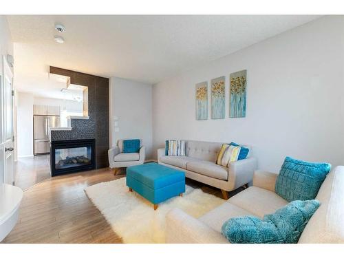 27 Nolanfield Terrace Nw, Calgary, AB - Indoor Photo Showing Living Room With Fireplace