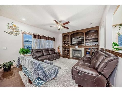 19 Taralake Mews Ne, Calgary, AB - Indoor Photo Showing Living Room With Fireplace