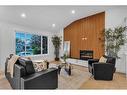 3244 Barr Road Nw, Calgary, AB  - Indoor Photo Showing Living Room With Fireplace 