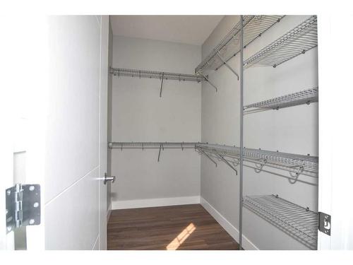 114 Carringford Close, Calgary, AB - Indoor With Storage