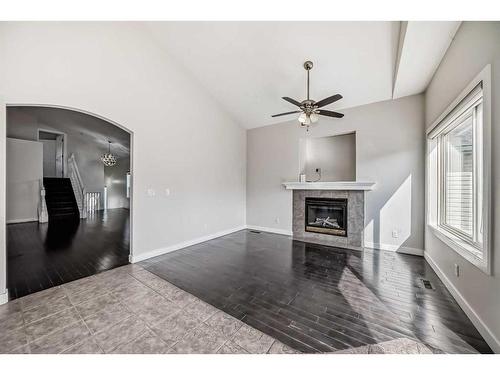 363 Taracove Estate Drive Ne, Calgary, AB - Indoor Photo Showing Living Room With Fireplace