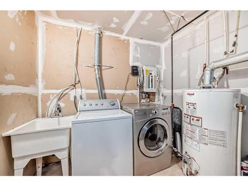 363 Taracove Estate Drive Ne, Calgary, AB - Indoor Photo Showing Laundry Room