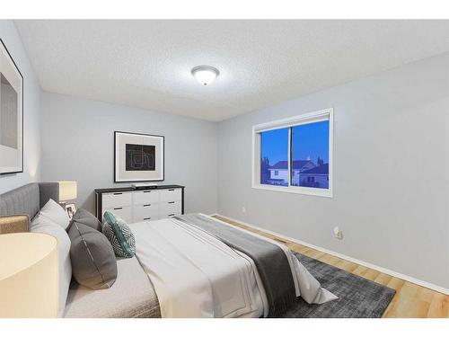 68 Bridlewood Crescent Sw, Calgary, AB - Indoor Photo Showing Bedroom