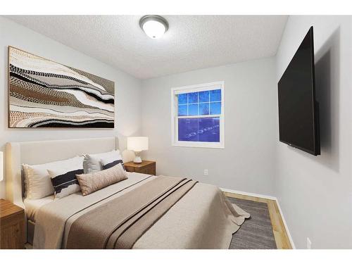 68 Bridlewood Crescent Sw, Calgary, AB - Indoor Photo Showing Bedroom