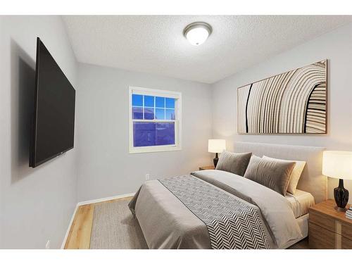 68 Bridlewood Crescent Sw, Calgary, AB - Indoor Photo Showing Bedroom