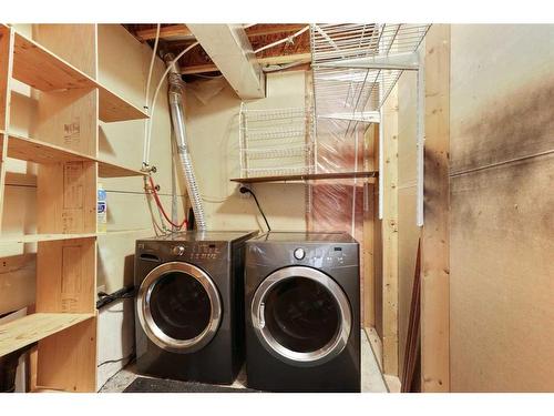 68 Bridlewood Crescent Sw, Calgary, AB - Indoor Photo Showing Laundry Room