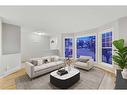 68 Bridlewood Crescent Sw, Calgary, AB  - Indoor Photo Showing Living Room 