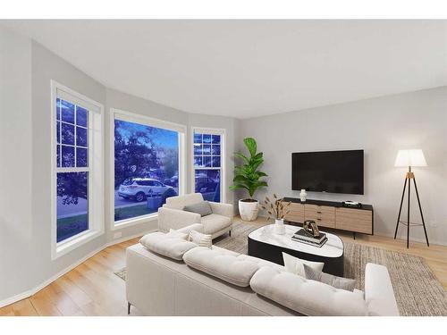 68 Bridlewood Crescent Sw, Calgary, AB - Indoor Photo Showing Living Room