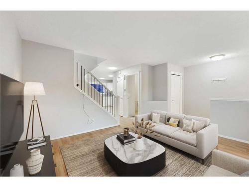 68 Bridlewood Crescent Sw, Calgary, AB - Indoor Photo Showing Living Room