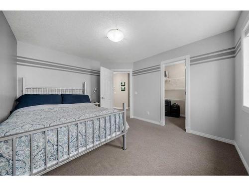 128 Elgin Estates Hill Se, Calgary, AB - Indoor Photo Showing Bedroom