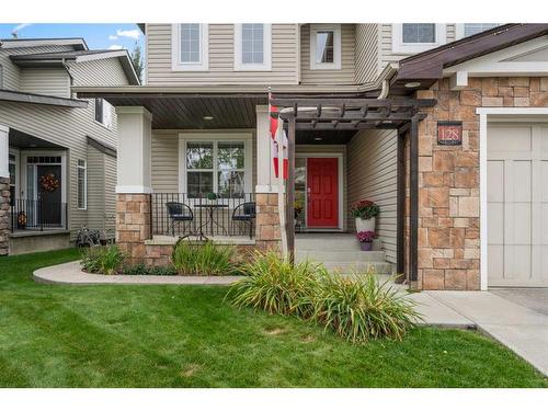 128 Elgin Estates Hill Se, Calgary, AB - Outdoor With Deck Patio Veranda With Facade