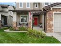 128 Elgin Estates Hill Se, Calgary, AB  - Outdoor With Deck Patio Veranda With Facade 