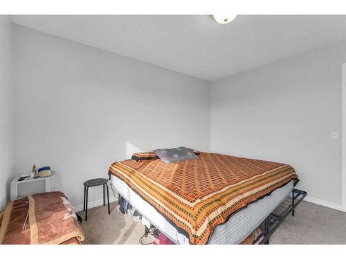 100 Martinvalley Crescent Ne, Calgary, AB - Indoor Photo Showing Bedroom