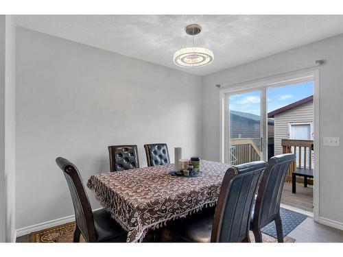 100 Martinvalley Crescent Ne, Calgary, AB - Indoor Photo Showing Dining Room