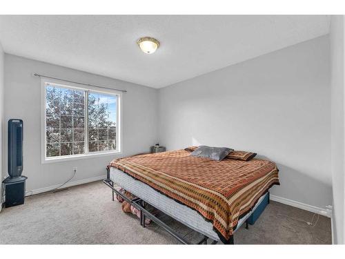 100 Martinvalley Crescent Ne, Calgary, AB - Indoor Photo Showing Bedroom