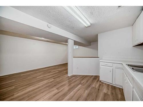 6303 Penbrooke Drive Se, Calgary, AB - Indoor Photo Showing Kitchen With Double Sink