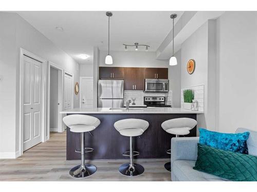 201-117 Copperpond Common Se, Calgary, AB - Indoor Photo Showing Kitchen