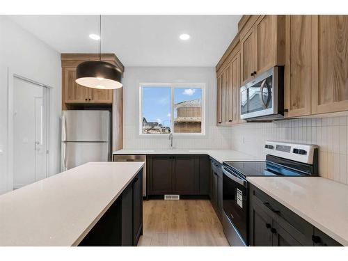 74 Sage Hill Lane Nw, Calgary, AB - Indoor Photo Showing Kitchen With Stainless Steel Kitchen