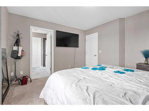 303 Sagewood Landing Sw, Airdrie, AB - Indoor Photo Showing Bedroom