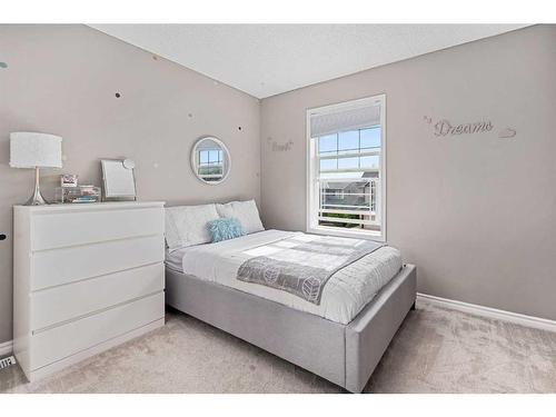 303 Sagewood Landing Sw, Airdrie, AB - Indoor Photo Showing Bedroom