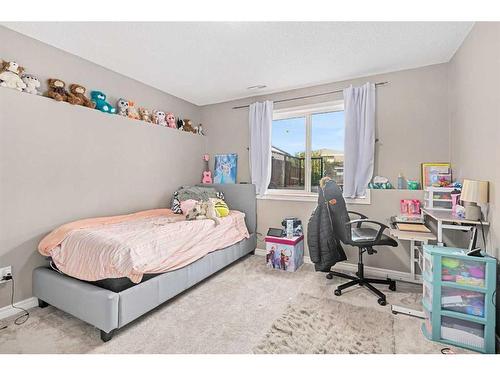 303 Sagewood Landing Sw, Airdrie, AB - Indoor Photo Showing Bedroom