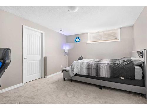 303 Sagewood Landing Sw, Airdrie, AB - Indoor Photo Showing Bedroom