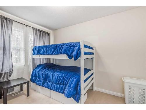 104 Panamount Manor Nw, Calgary, AB - Indoor Photo Showing Bedroom