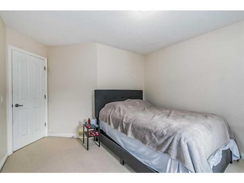 104 Panamount Manor Nw, Calgary, AB - Indoor Photo Showing Bedroom