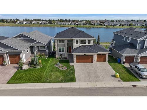 43 Lakes Estates Circle, Strathmore, AB - Outdoor With Body Of Water With Facade