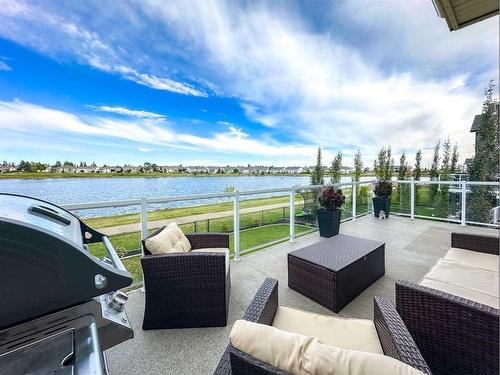 43 Lakes Estates Circle, Strathmore, AB - Outdoor With Body Of Water With Deck Patio Veranda With View