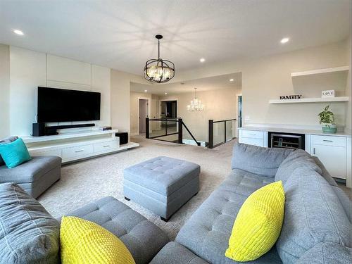 43 Lakes Estates Circle, Strathmore, AB - Indoor Photo Showing Living Room With Fireplace