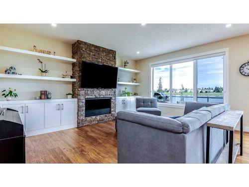 43 Lakes Estates Circle, Strathmore, AB - Indoor Photo Showing Living Room With Fireplace