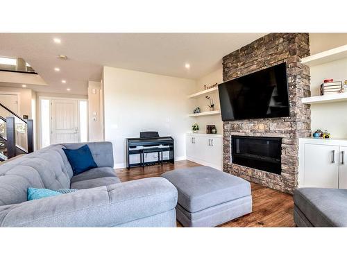 43 Lakes Estates Circle, Strathmore, AB - Indoor Photo Showing Living Room With Fireplace