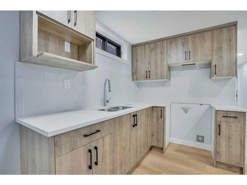 59 Whitehaven Road Ne, Calgary, AB - Indoor Photo Showing Kitchen With Double Sink