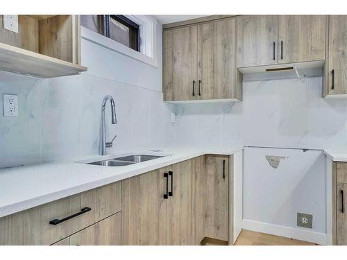 59 Whitehaven Road Ne, Calgary, AB - Indoor Photo Showing Kitchen With Double Sink