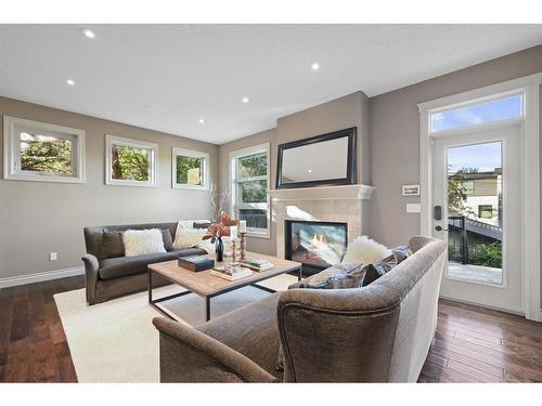 1404 21 Avenue Nw, Calgary, AB - Indoor Photo Showing Living Room With Fireplace