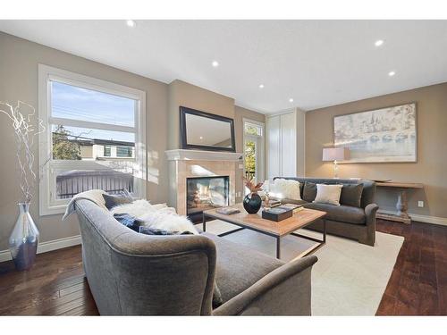 1404 21 Avenue Nw, Calgary, AB - Indoor Photo Showing Living Room With Fireplace