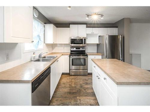 362 Copperfield Grove Se, Calgary, AB - Indoor Photo Showing Kitchen With Stainless Steel Kitchen With Double Sink