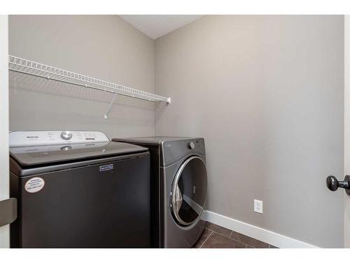 25 Cranleigh Heath Se, Calgary, AB - Indoor Photo Showing Laundry Room