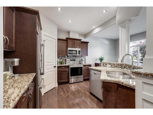 25 Cranleigh Heath Se, Calgary, AB - Indoor Photo Showing Kitchen With Stainless Steel Kitchen With Double Sink With Upgraded Kitchen