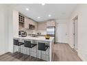 403-301 10 Street Nw, Calgary, AB  - Indoor Photo Showing Kitchen With Stainless Steel Kitchen With Upgraded Kitchen 