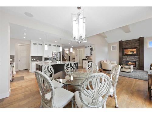 59 Evansridge View Nw, Calgary, AB - Indoor Photo Showing Dining Room With Fireplace