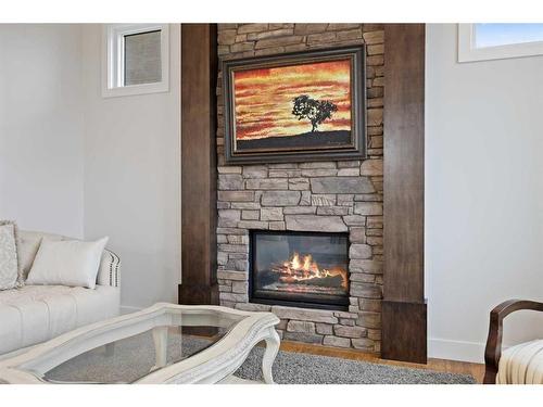 59 Evansridge View Nw, Calgary, AB - Indoor Photo Showing Living Room With Fireplace