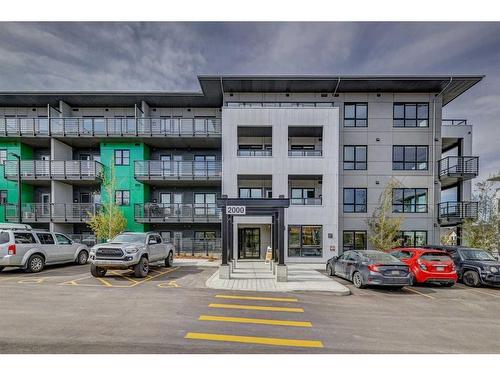 2401-350 Livingston Common Ne, Calgary, AB - Outdoor With Balcony With Facade