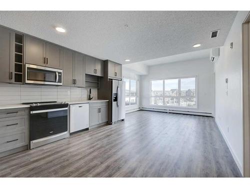 2401-350 Livingston Common Ne, Calgary, AB - Indoor Photo Showing Kitchen With Upgraded Kitchen