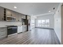 2401-350 Livingston Common Ne, Calgary, AB  - Indoor Photo Showing Kitchen With Upgraded Kitchen 