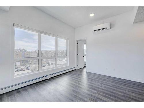 2401-350 Livingston Common Ne, Calgary, AB - Indoor Photo Showing Other Room