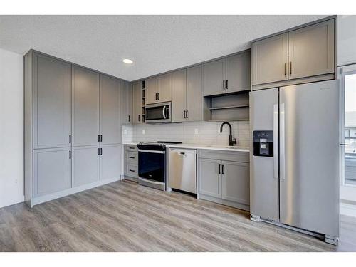 2401-350 Livingston Common Ne, Calgary, AB - Indoor Photo Showing Kitchen With Stainless Steel Kitchen