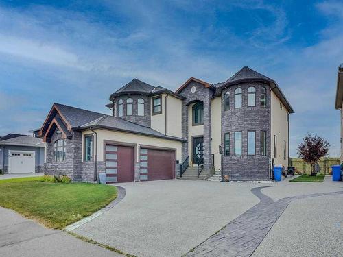 106 Trinity Road, Rural Rocky View County, AB - Outdoor With Facade